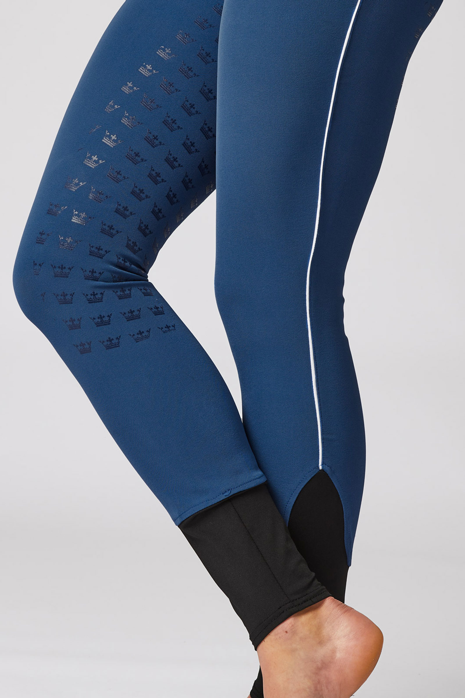 Damskie bryczesy z wysokim stanem, pełnym lejem i kontrastową lam&oacute;wką